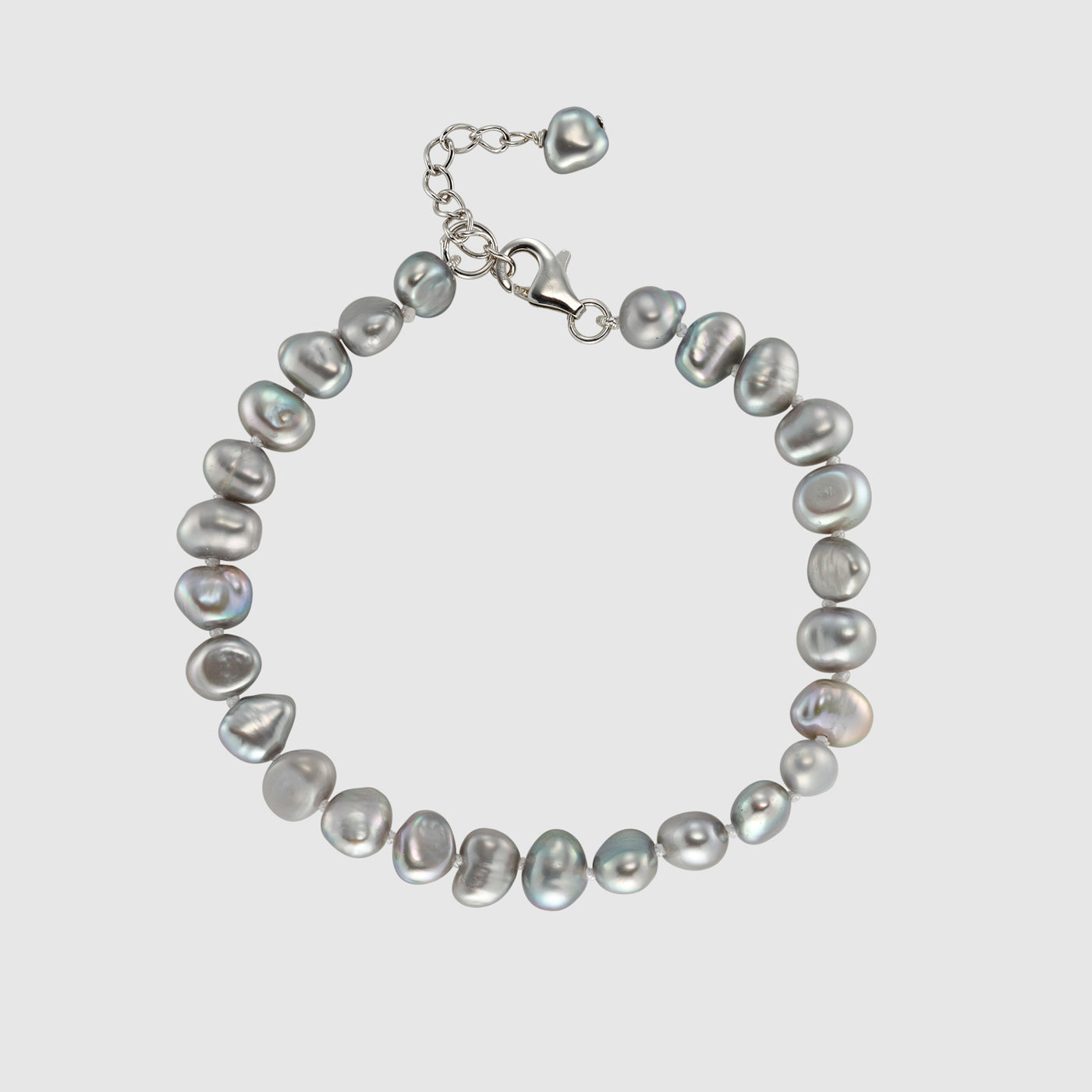 Silver bracelet with and grey good pearls